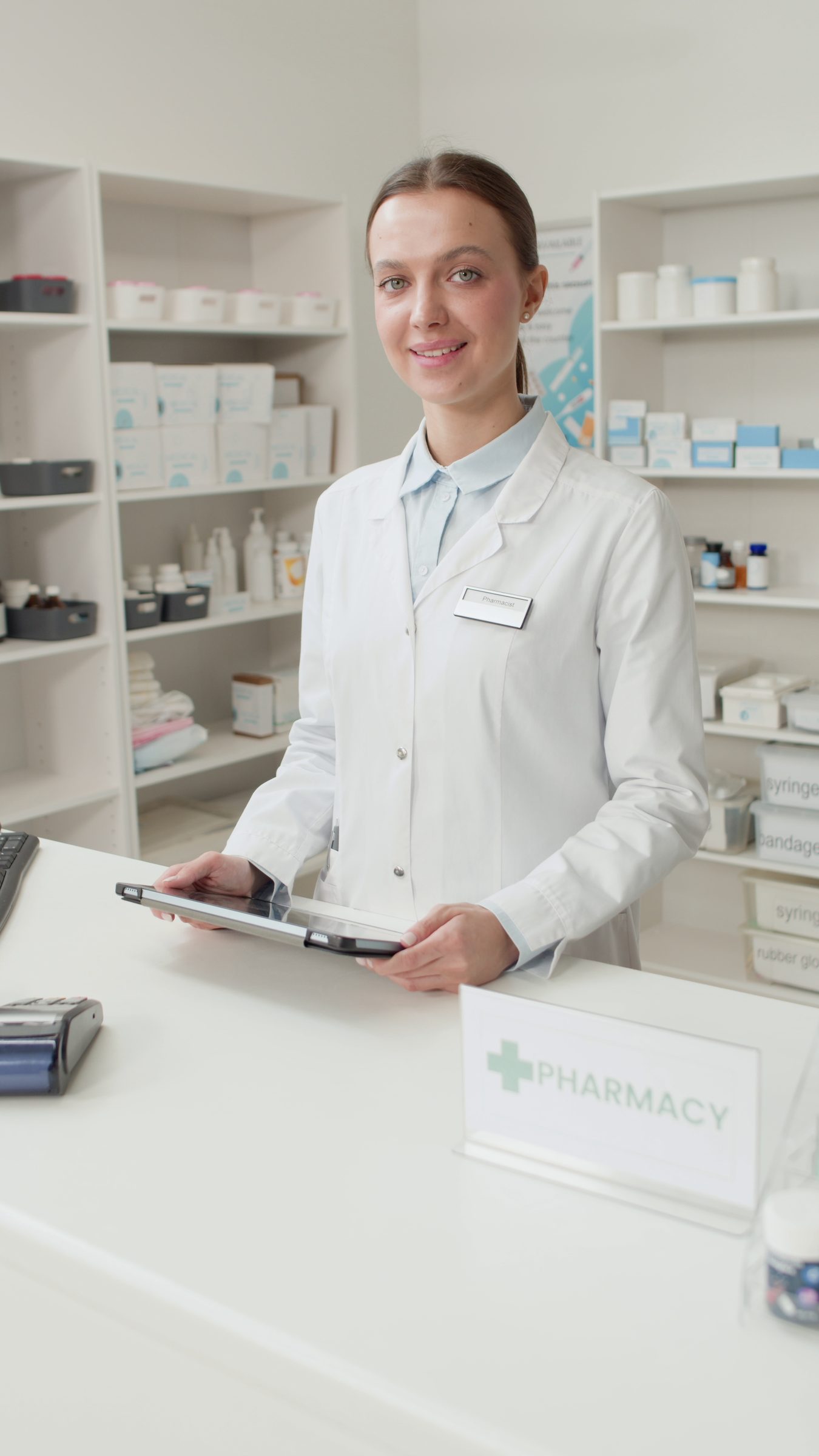 A pharmacist working at a pharmacy counter